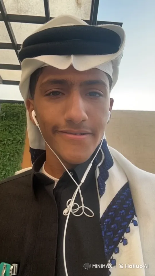 Traditional Attired Person Smoking in Courtyard Setting – AI Generated Video | Hailuo AI