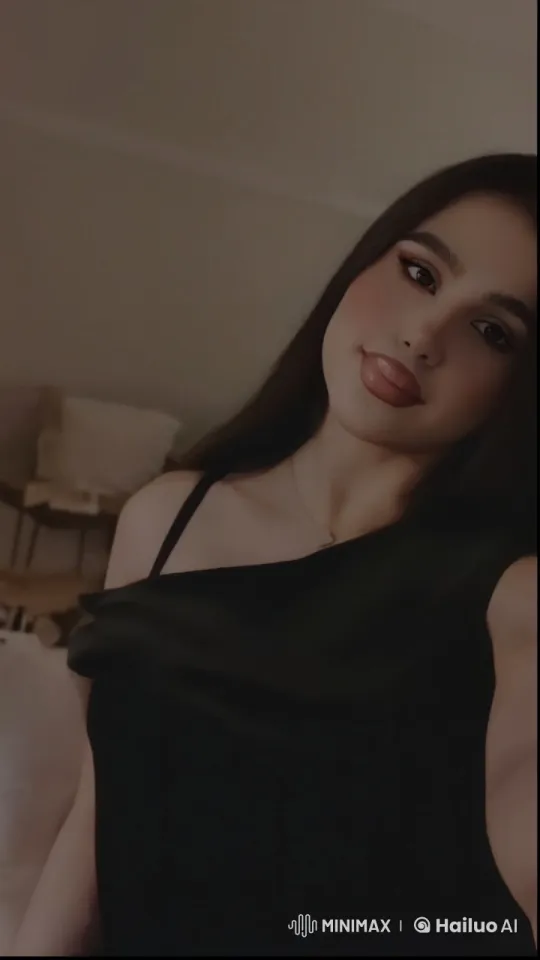 Sophisticated Woman in Black Dress Smoking in Dimly Lit Room – AI Generated Video | Hailuo AI