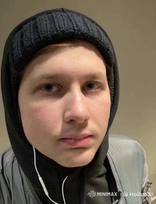 Person in Gray Beanie Blows Kisses to Camera – AI Generated Video | Hailuo AI