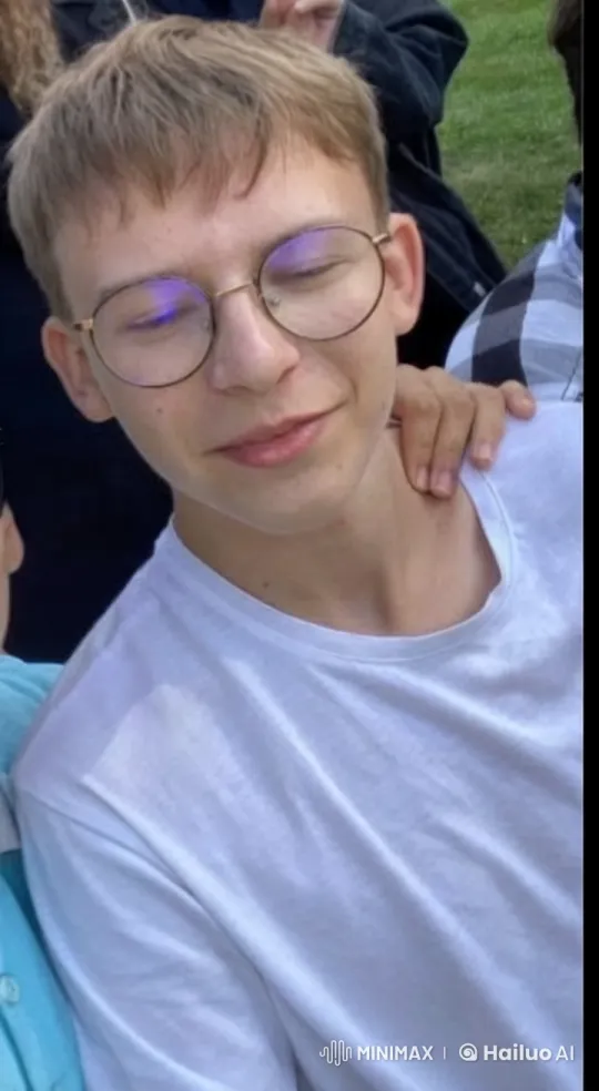 Young Man Kisses and Slaps Friend in Outdoor Setting – AI Generated Video | Hailuo AI