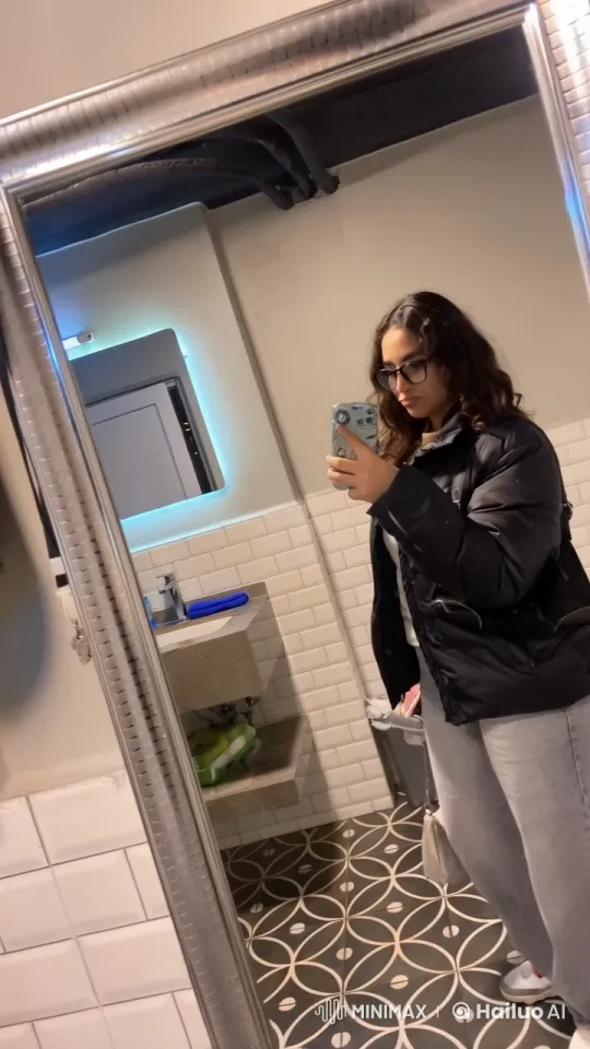 Modern Bathroom Self-Reflection with Phone and Cigarette – AI Generated Video | Hailuo AI