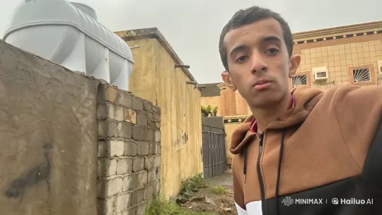 Urban Reflection: Smoker by Concrete Wall – AI Generated Video | Hailuo AI