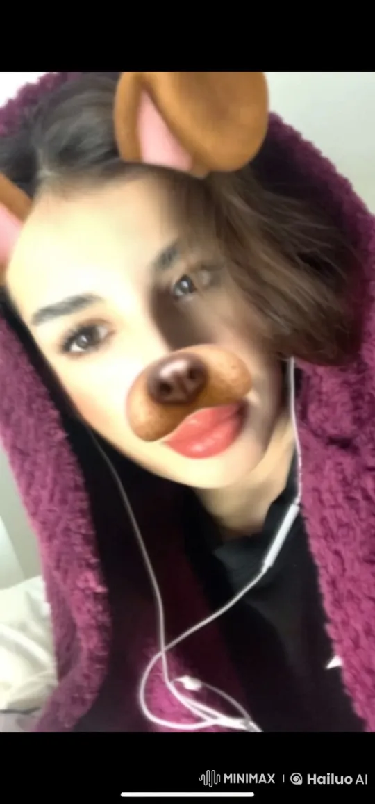 Person Smoking with Dog Ears Filter in Cozy Setting – AI Generated Video | Hailuo AI