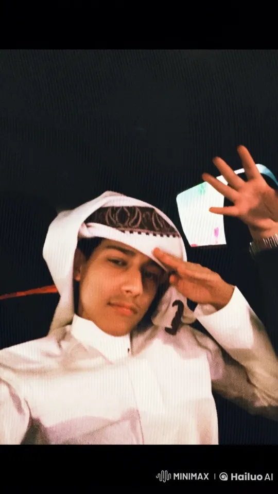Traditional Garb Figure Smokes in Dimly Lit Car Scene – AI Generated Video | Hailuo AI