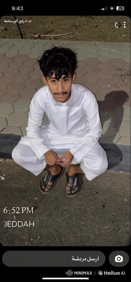Traditional Attired Person Smoking in Jeddah – AI Generated Video | Hailuo AI