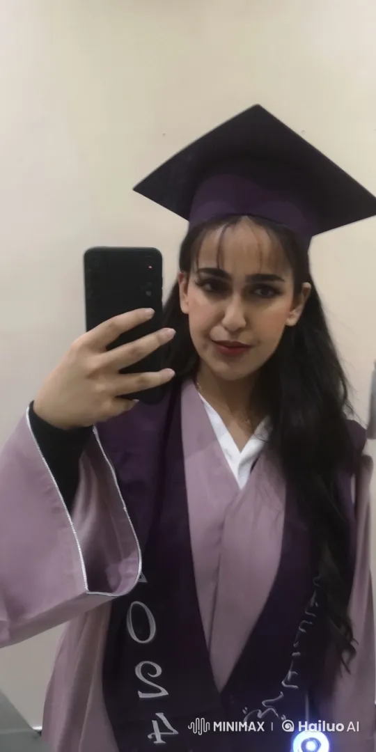 Graduate Celebrates with Selfie and Cigarette – AI Generated Video | Hailuo AI