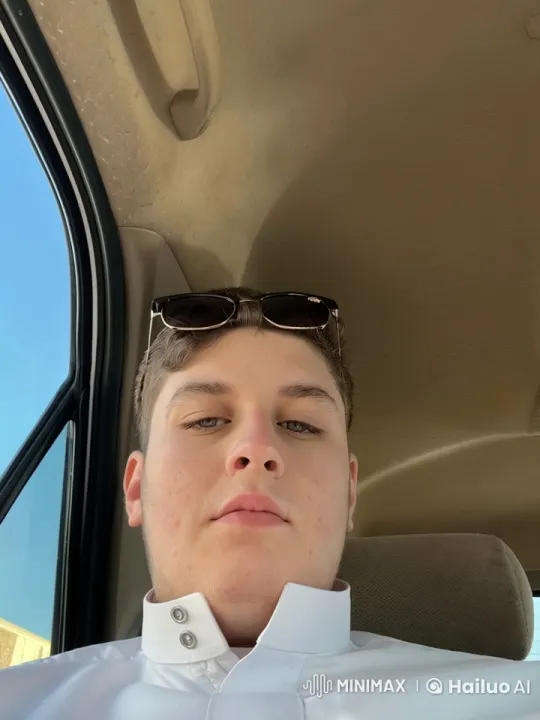 Relaxed Person Smokes in Car, Clear Sky Outside – AI Generated Video | Hailuo AI