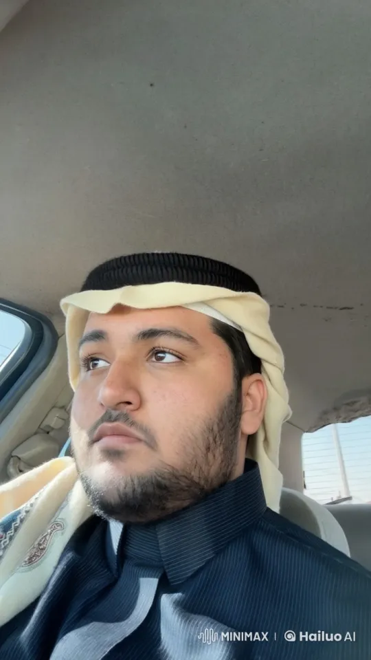 Man Smoking in Car with Traditional Attire – AI Generated Video | Hailuo AI