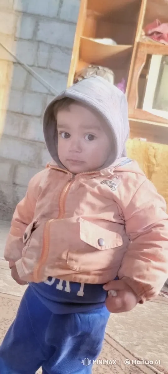 Child Pretends to Smoke in Winter Clothing – AI Generated Video | Hailuo AI