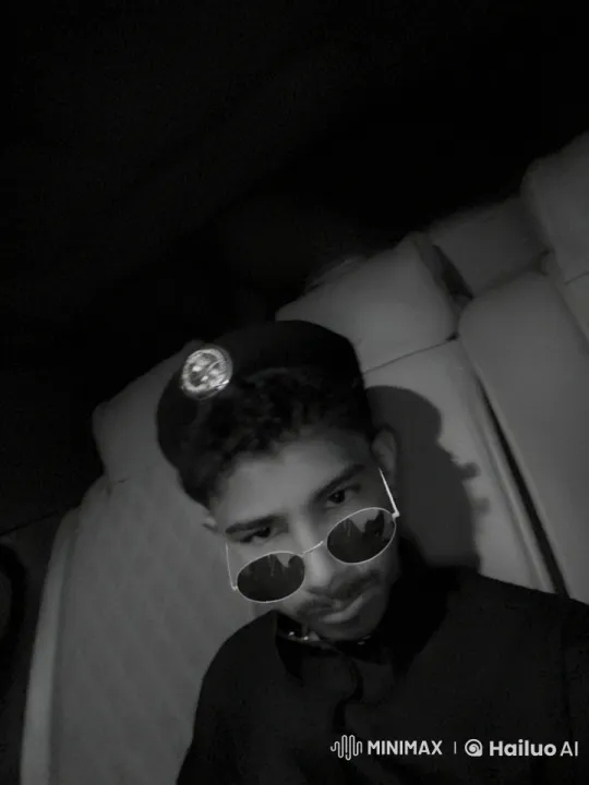 Man Smoking in Dimly Lit Car Interior – AI Generated Video | Hailuo AI