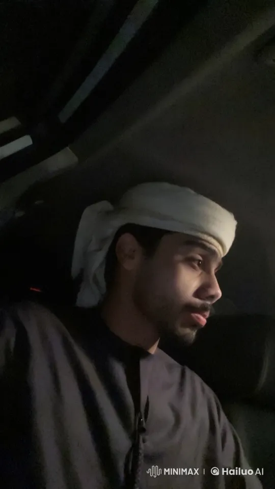 Dimly Lit Car: Smoking Scene with Subdued Ambiance – AI Generated Video | Hailuo AI