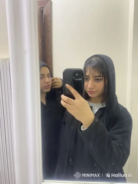 Person Taking Selfie With Cigarette in Mirror – AI Generated Video | Hailuo AI