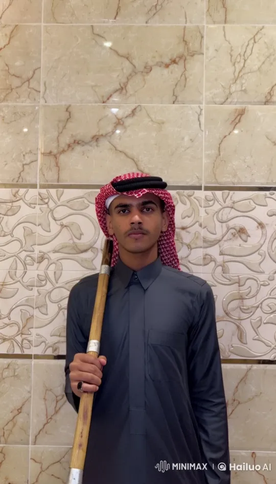 Person Smoking Traditional Attire by Marble Wall in Live2D – AI Generated Video | Hailuo AI
