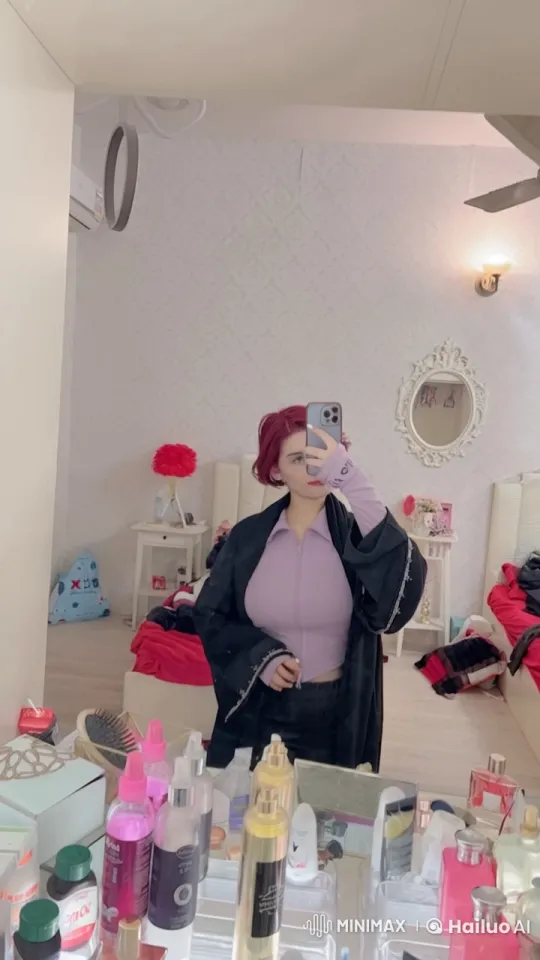 Young Individual in Lavender Top Reflecting in Bedroom Mirror – AI Generated Video | Hailuo AI