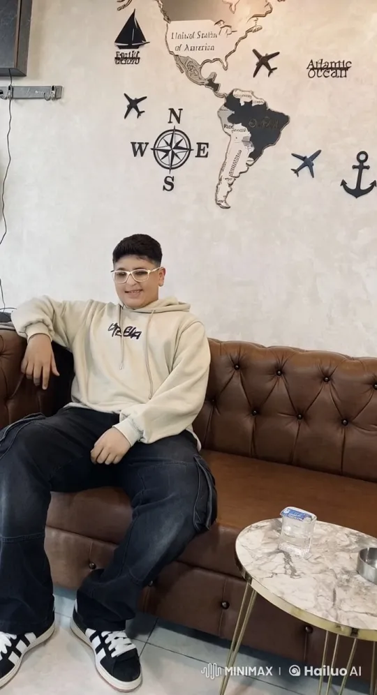 Young Man Relaxing with Cigarette in Stylish Room – AI Generated Video | Hailuo AI