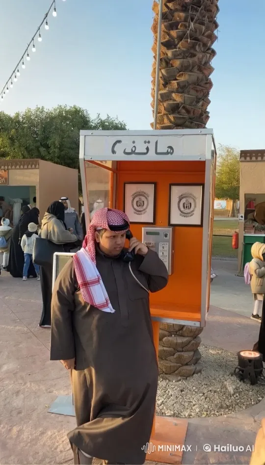 Man on Phone Amidst Lively Outdoor Scene – AI Generated Video | Hailuo AI