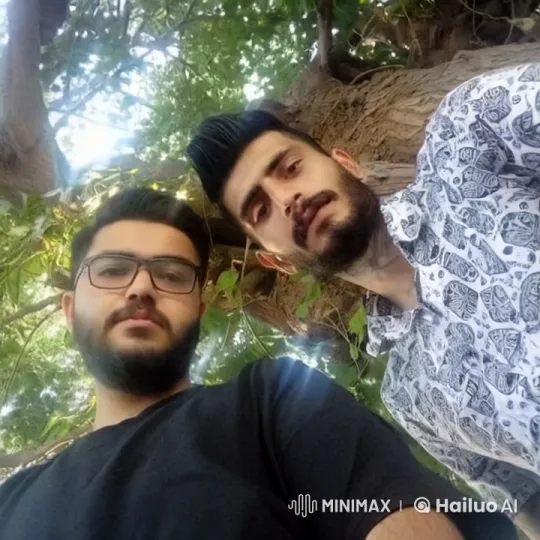 Two Men Share a Tender Kiss Under a Tree – AI Generated Video | Hailuo AI