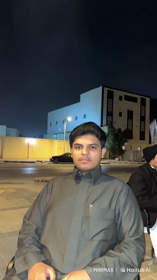 Young Man Smoking in Night Urban Setting – AI Generated Video | Hailuo AI