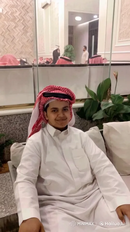 Young Person Smoking in Traditional Attire Indoors – AI Generated Video | Hailuo AI