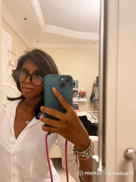 Young Woman Smoking, Taking Selfie in Cozy Bedroom – AI Generated Video | Hailuo AI