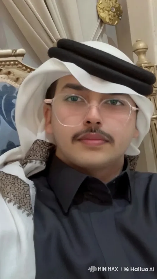 Man in Traditional Attire Relaxing with a Cigarette – AI Generated Video | Hailuo AI