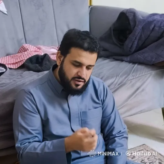 Man Smoking by Couch in Traditional Outfit – AI Generated Video | Hailuo AI