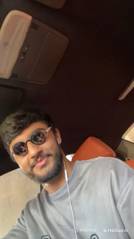 Young Man Smoking Calmly in Car Interior – AI Generated Video | Hailuo AI