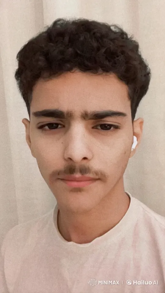 Young Man Reflects with Cigarette in Quiet Scene – AI Generated Video | Hailuo AI