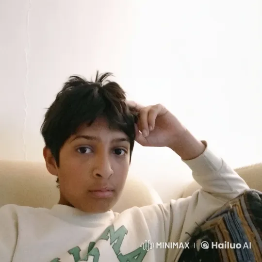 Young Person Relaxing on Couch, Smoking – AI Generated Video | Hailuo AI