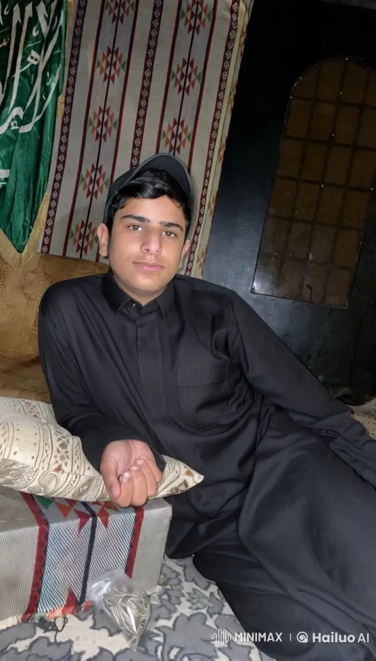 Boy Reclining in Traditional Decor with Smoking Paraphernalia – AI Generated Video | Hailuo AI