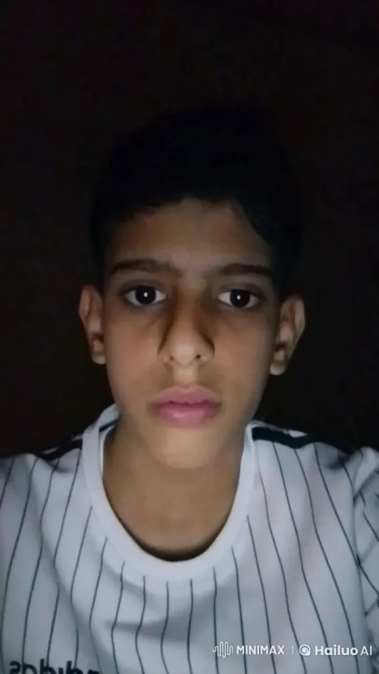 Young Person Contemplates in Dimly Lit Room with Cigarette – AI Generated Video | Hailuo AI