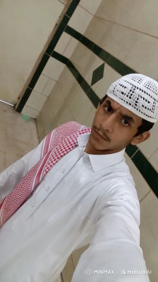 Young Man in Traditional Attire Takes Serious Selfie, Smokes Calmly – AI Generated Video | Hailuo AI