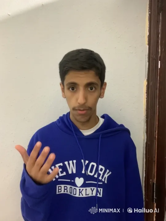 Young Man Mimics Smoking Indoors – AI Generated Video | Hailuo AI