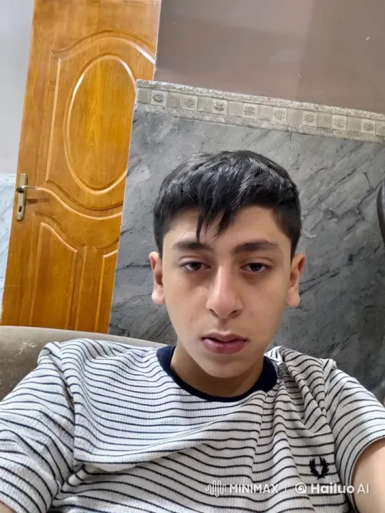 Young Man Smoking Thoughtfully Indoors – AI Generated Video | Hailuo AI