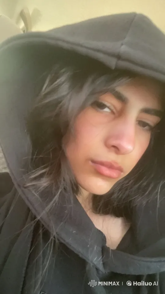 Contemplative Person Lights Cigarette in Serene Moment – AI Generated Video | Hailuo AI