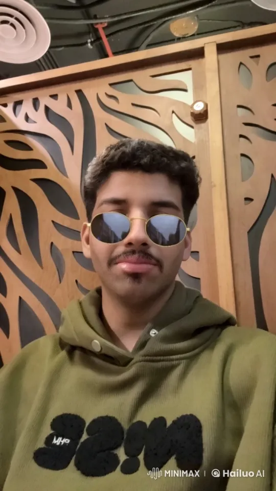 Young Man Smoking in Dimly Lit Room – AI Generated Video | Hailuo AI