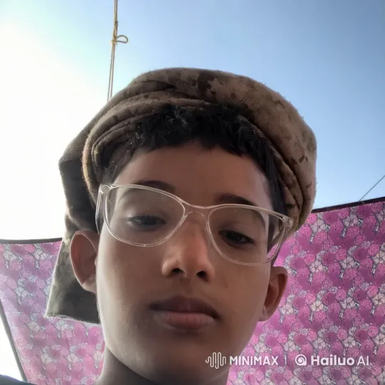 Woman Adjusts Headscarf Outdoors with Floral Canvas Background – AI Generated Video | Hailuo AI