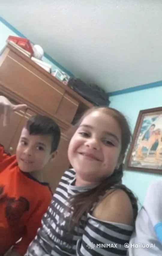 Children Blowing Kisses in a Cozy Room – AI Generated Video | Hailuo AI