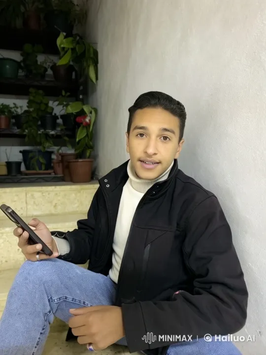 Young Man on Stairs With Smartphone, Live2D Animation – AI Generated Video | Hailuo AI