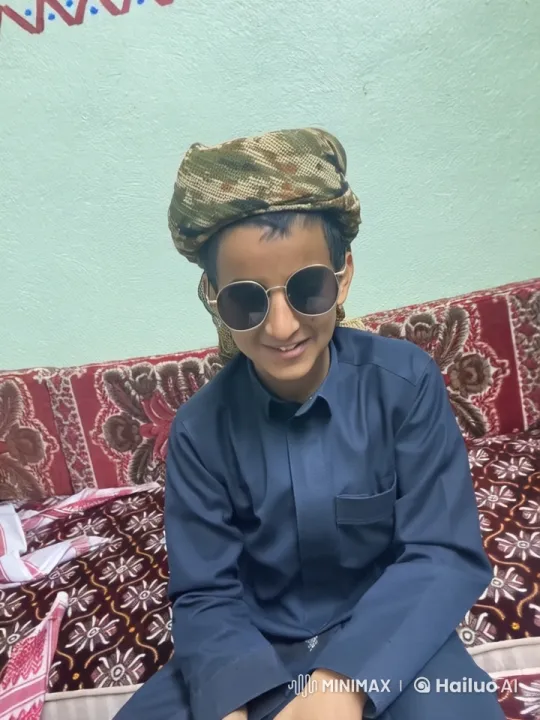 Traditional Attired Person Smoking on Sofa – AI Generated Video | Hailuo AI