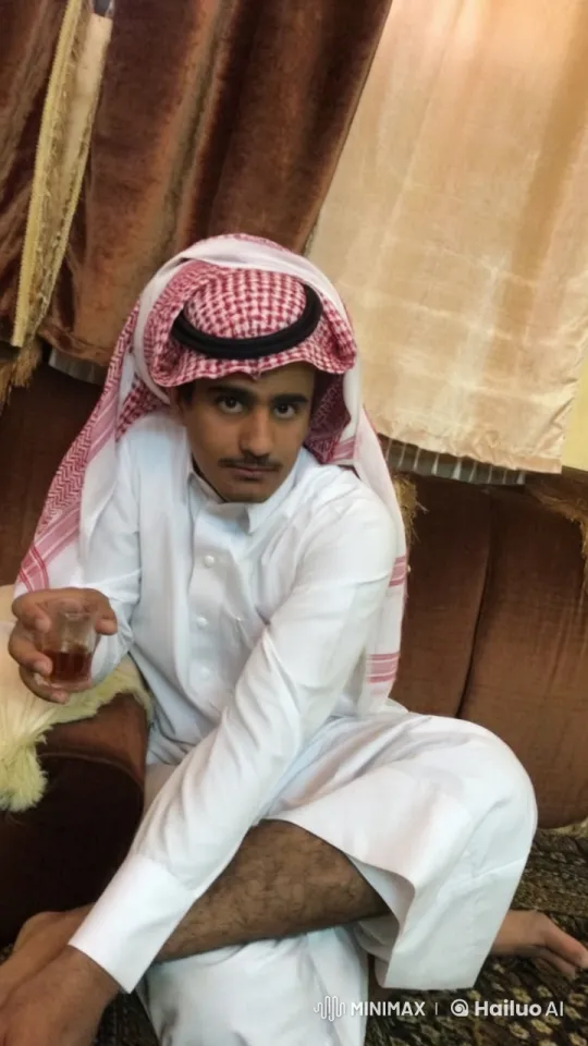 Man Enjoying Tea in Traditional Attire – AI Generated Video | Hailuo AI