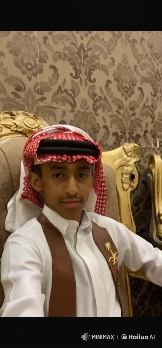 Young Man Smokes Gracefully in Traditional Attire – AI Generated Video | Hailuo AI