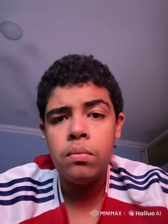 Person Smoking Indoors with Neutral Expression – AI Generated Video | Hailuo AI