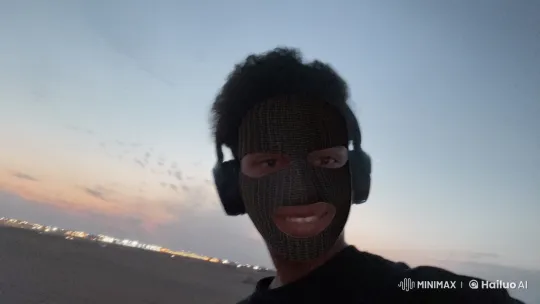 Contemplative Person Smokes at Sunset with Nightfall – AI Generated Video | Hailuo AI