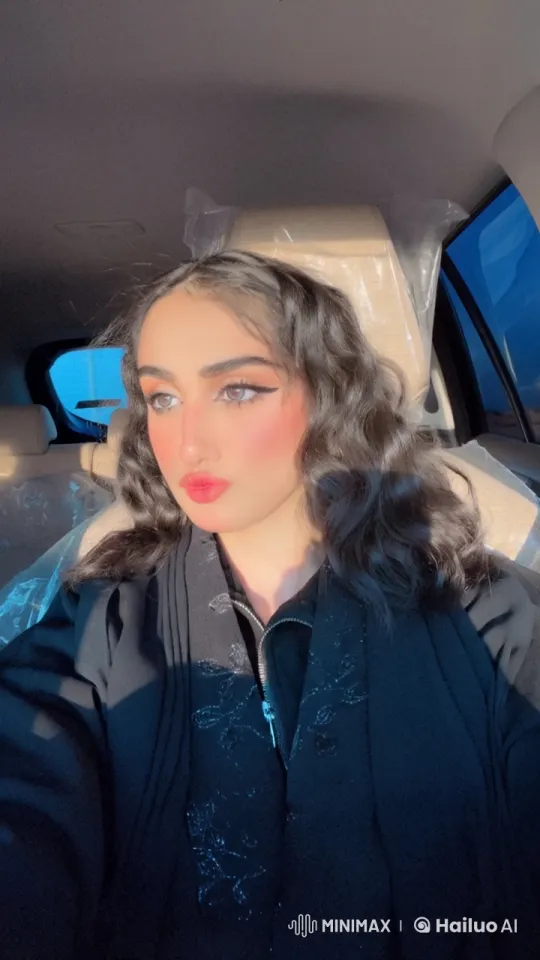 Tranquil Car Interior: Person Smoking Reflectively – AI Generated Video | Hailuo AI
