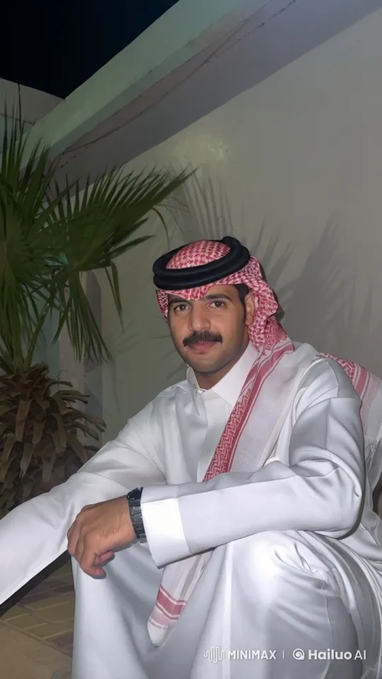 Young Man Reflects in Traditional Attire – AI Generated Video | Hailuo AI