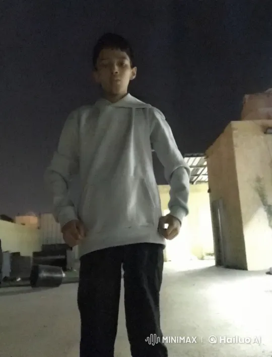 Nighttime Figure Mimics Smoking in Dark Outdoor Scene – AI Generated Video | Hailuo AI
