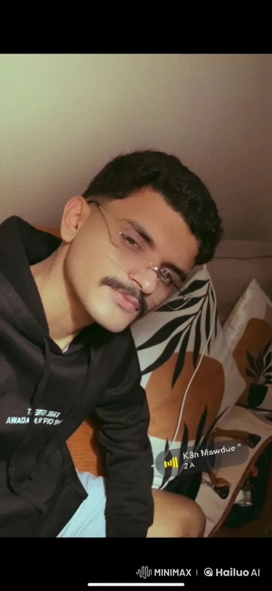 Leisurely Person Smoking on Couch with Decor – AI Generated Video | Hailuo AI