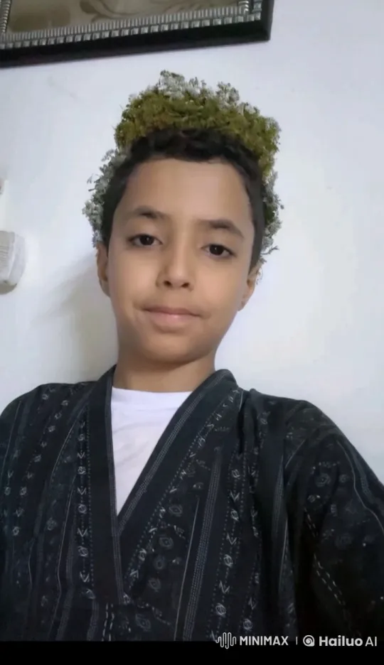 Young Boy Mimics Smoking in Traditional Attire – AI Generated Video | Hailuo AI