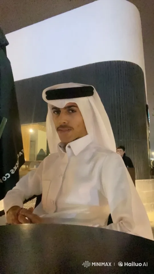 Nighttime Café: Man in White, Smoking – AI Generated Video | Hailuo AI